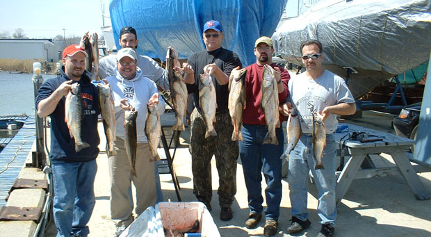 Customers showing off the number of fish caught