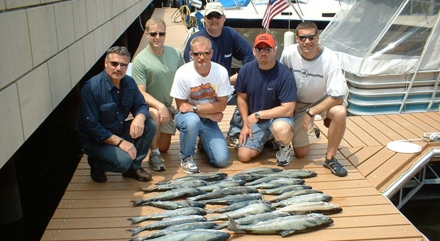 Customers displaying the haul of fish caught on the Blue Max