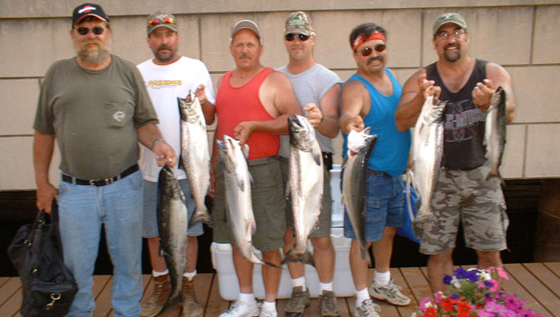 Customers showing off the fish they caught
